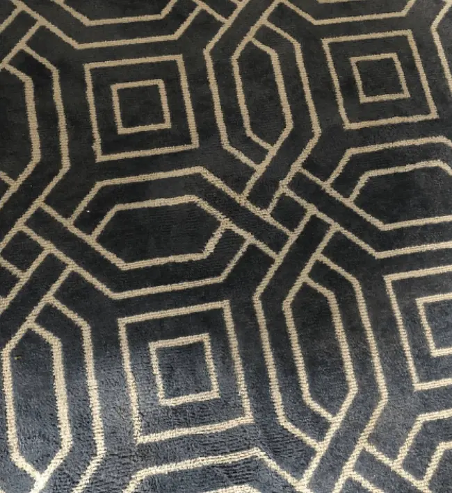 After carpet treatment: the red wine staining is no longer visible in the photographed area