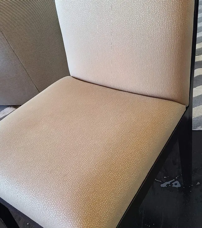 After upholstery cleaning: the chair with reduced visible spotting
